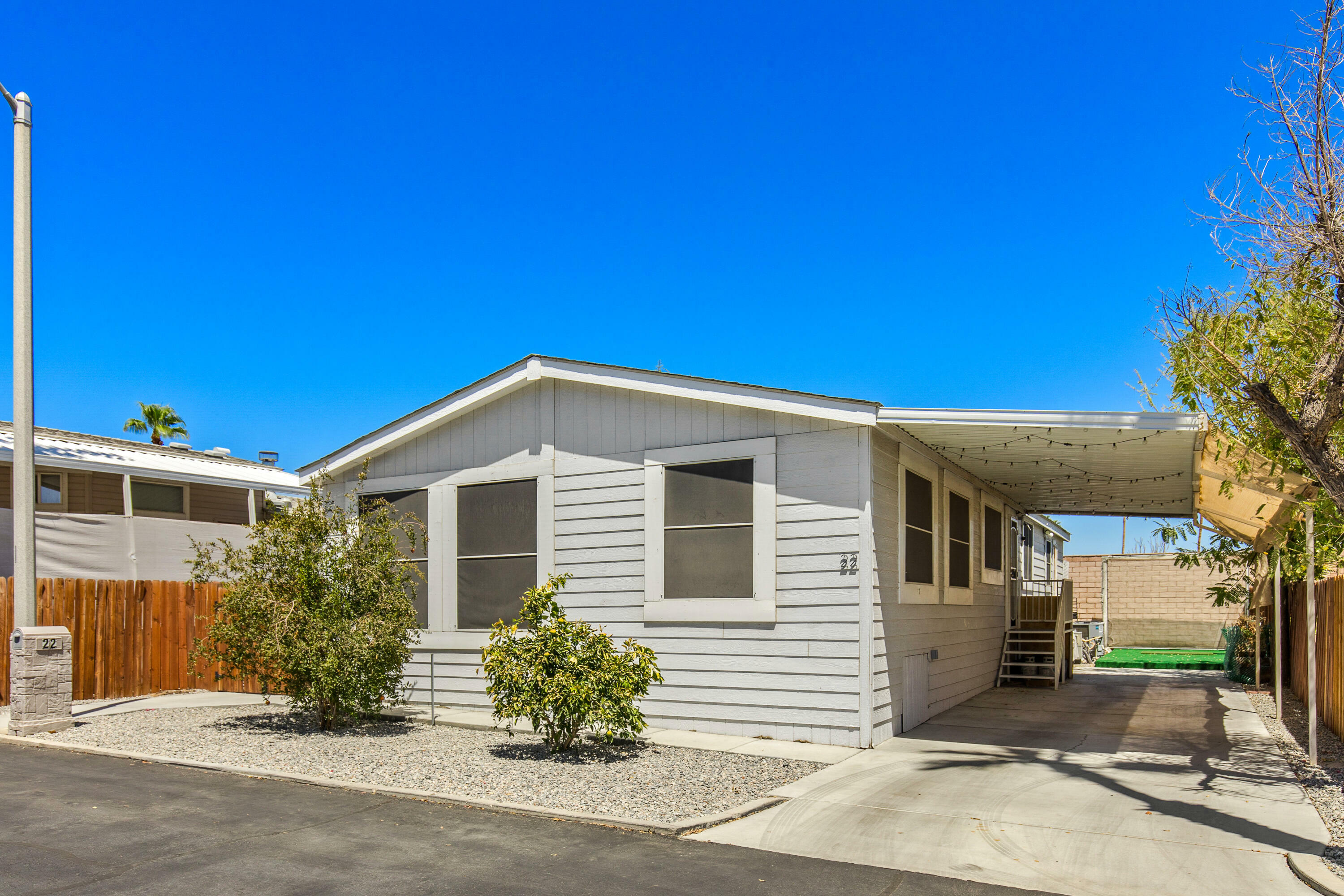 Property Photo:  43155 Portola Avenue 22  CA 92260 