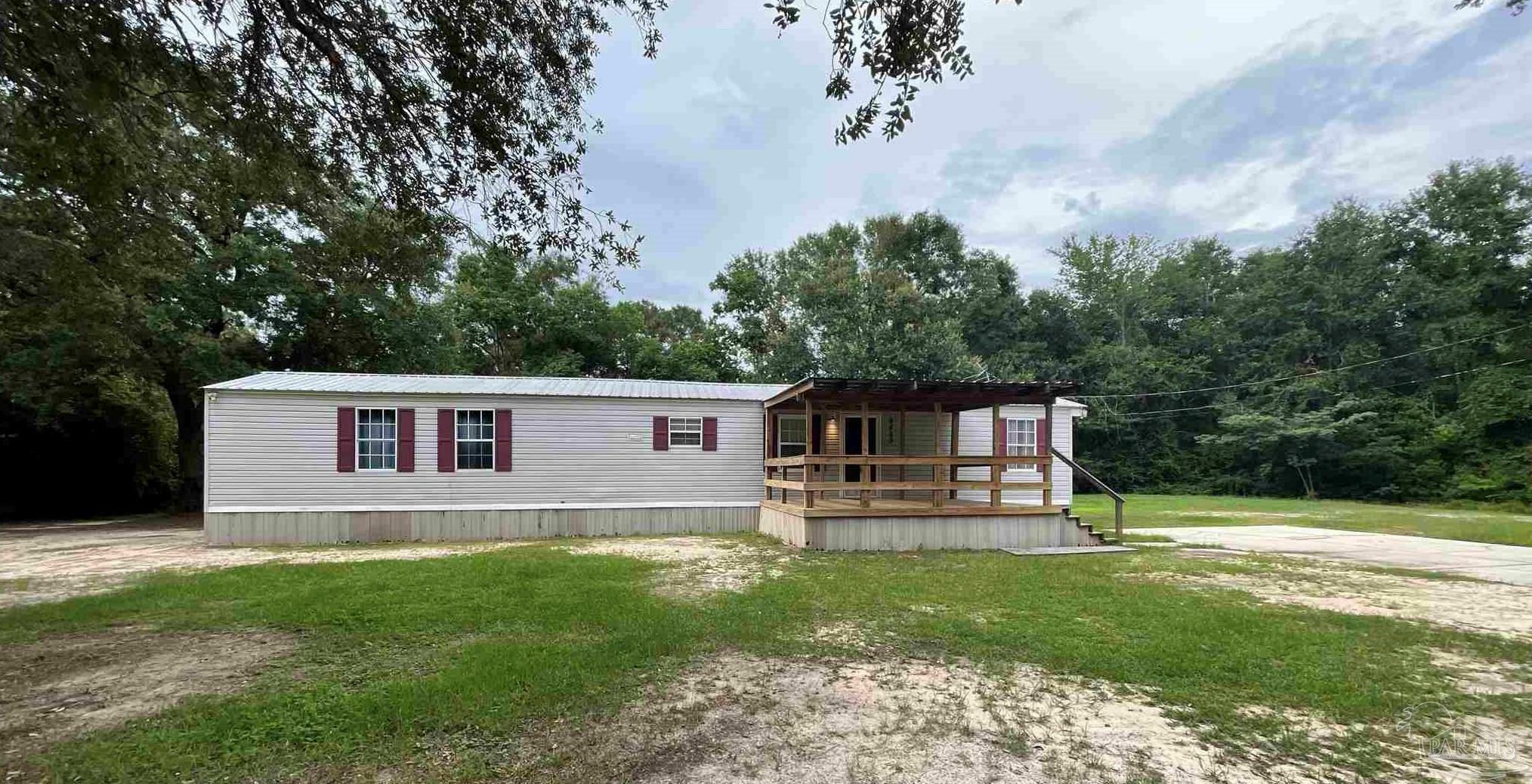 Property Photo:  6480 Robie Rd  FL 32570 