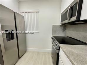 Property Photo:  7720 Camino Real E412  FL 33143 