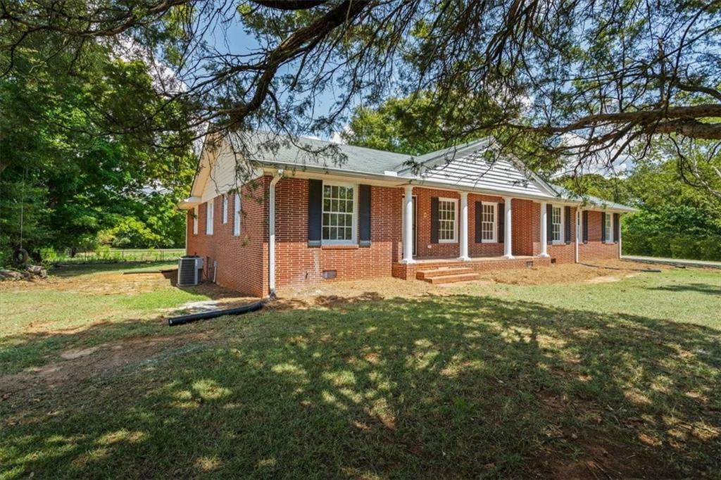 Property Photo:  619 East Lake Road  GA 30252 