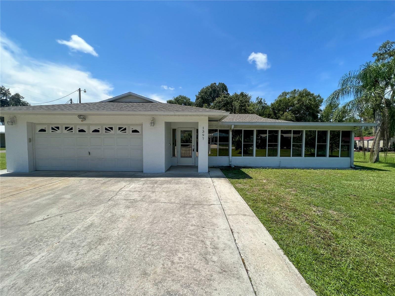 Property Photo:  1397 Cr 446A  FL 33538 