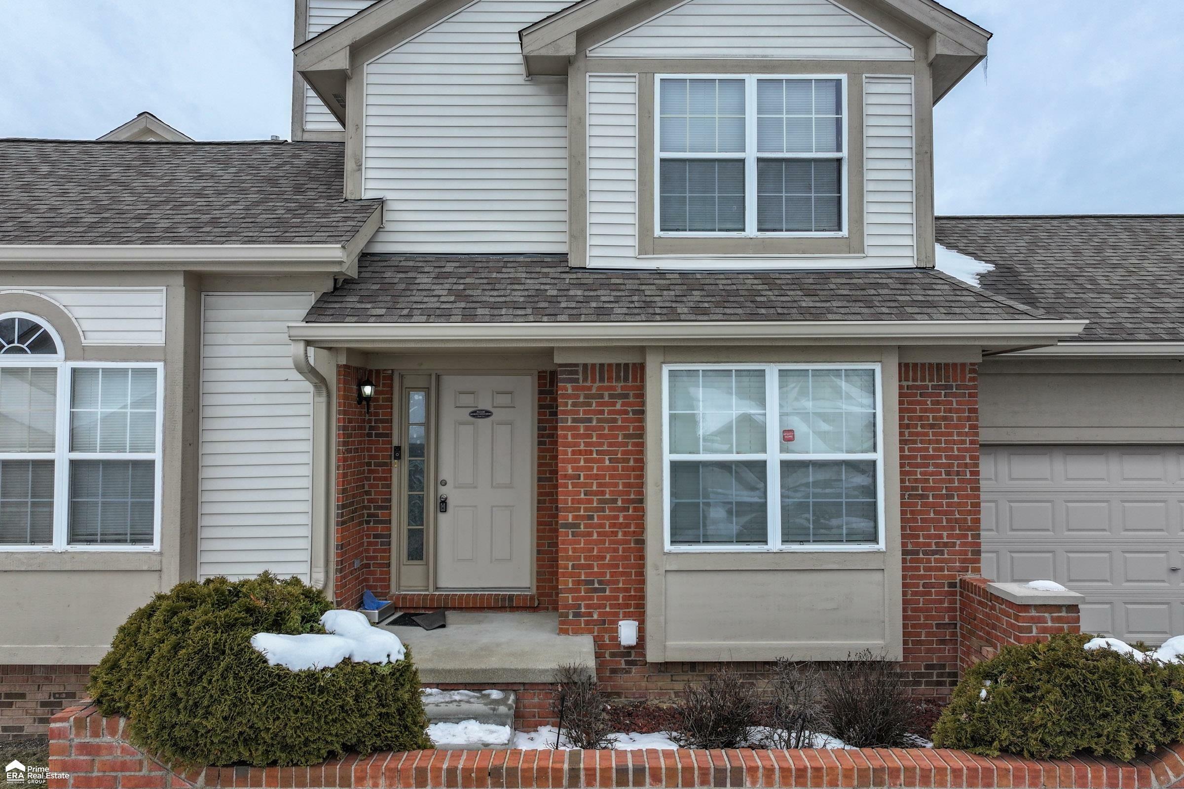 Property Photo:  10325 Champions Cir Circle  MI 48439 