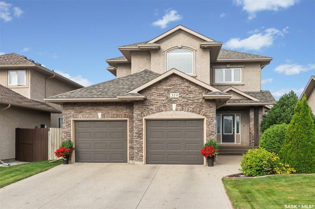 Property Photo:  319 Baillie Cove  SK S7T 0A3 