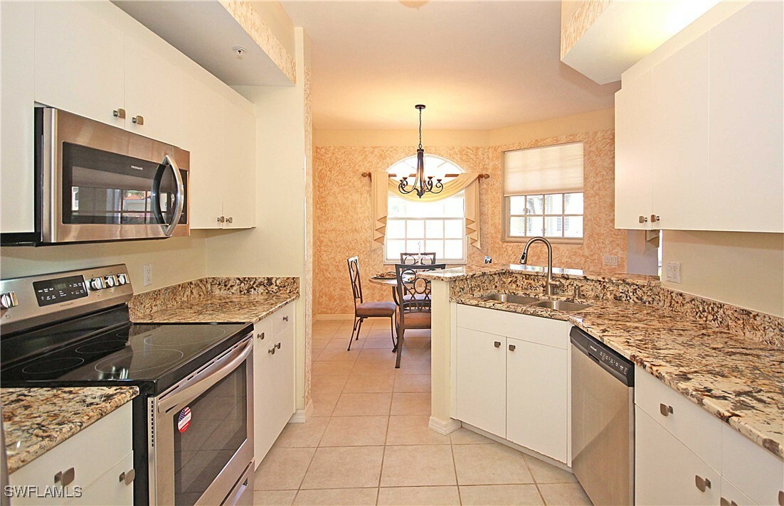 Property Photo:  500 L'Ambiance Circle 5-104  FL 34108 