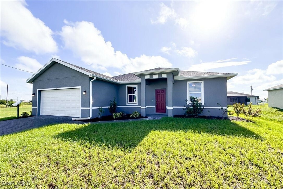 Property Photo:  521 NW 25th Avenue  FL 33993 