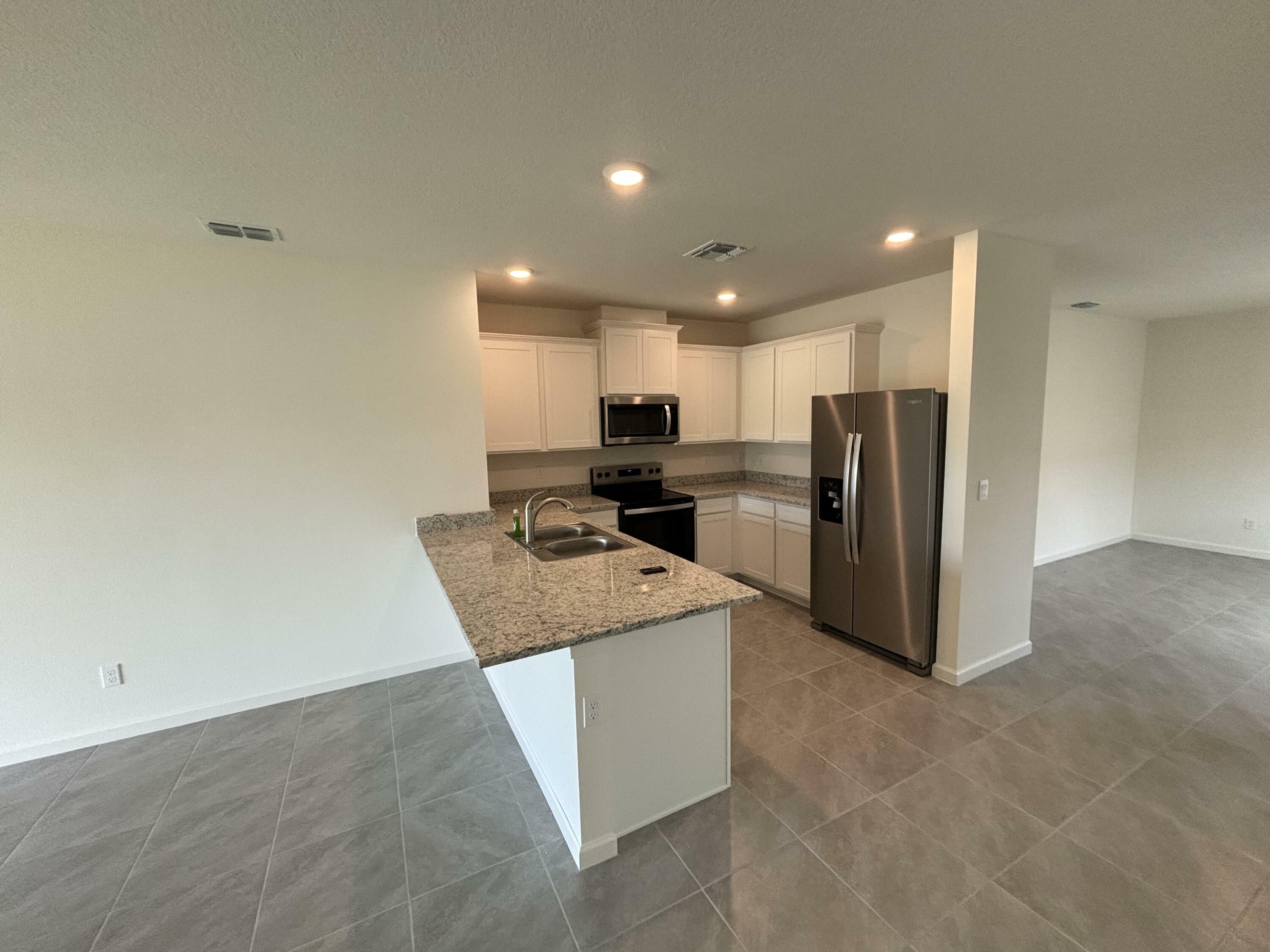 Property Photo:  12428 SW Rimini Way  FL 34987 