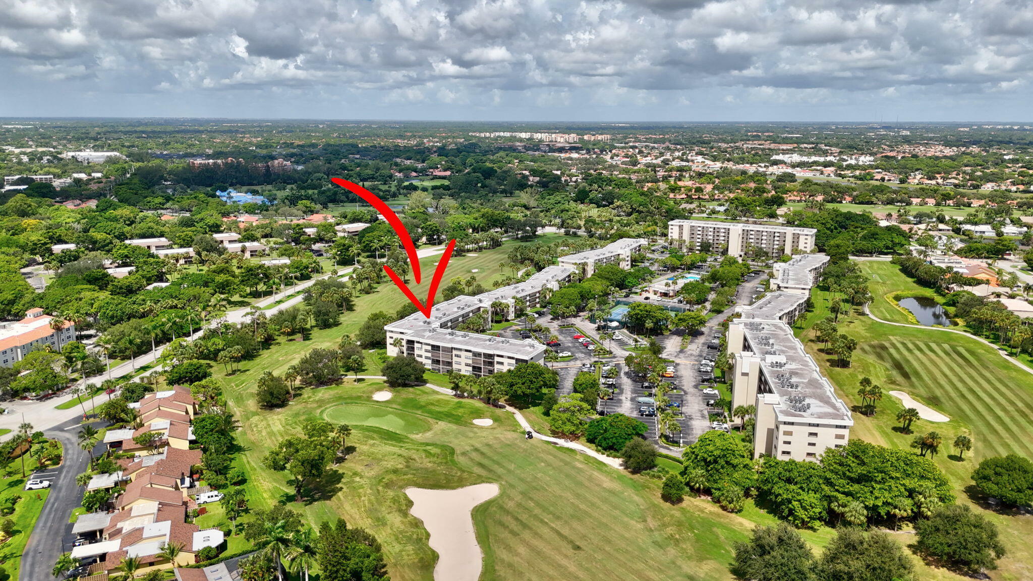 Property Photo:  2440 Deer Creek Country Club Boulevard 104-C  FL 33442 