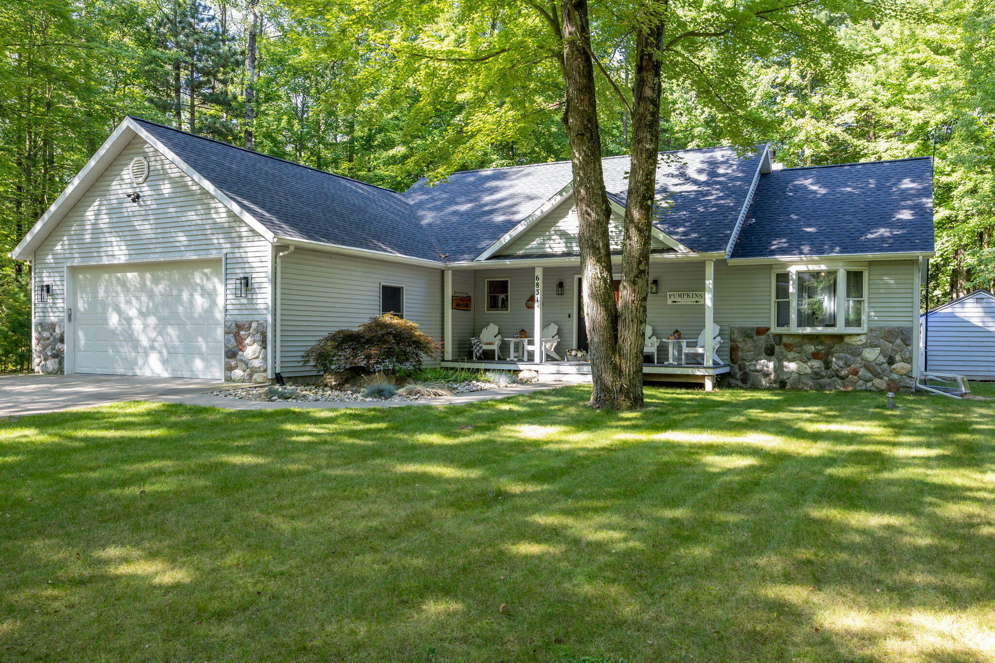 Property Photo:  6831 White Pine Drive  MI 49346 