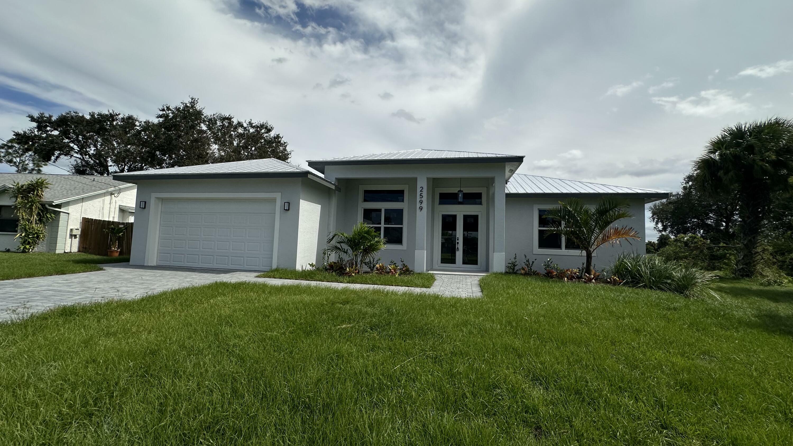 Property Photo:  2599 SW Calender Street  FL 34953 