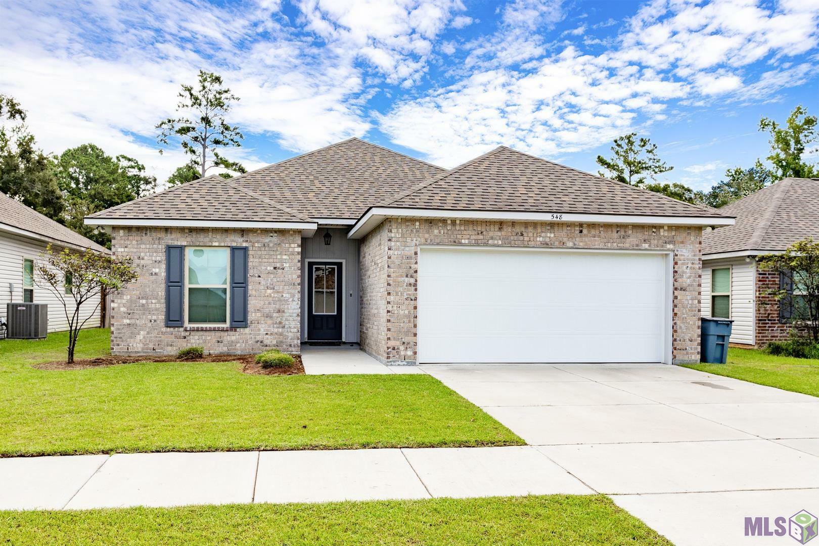 Property Photo: 548 Whispering Waters Ave LA 70737