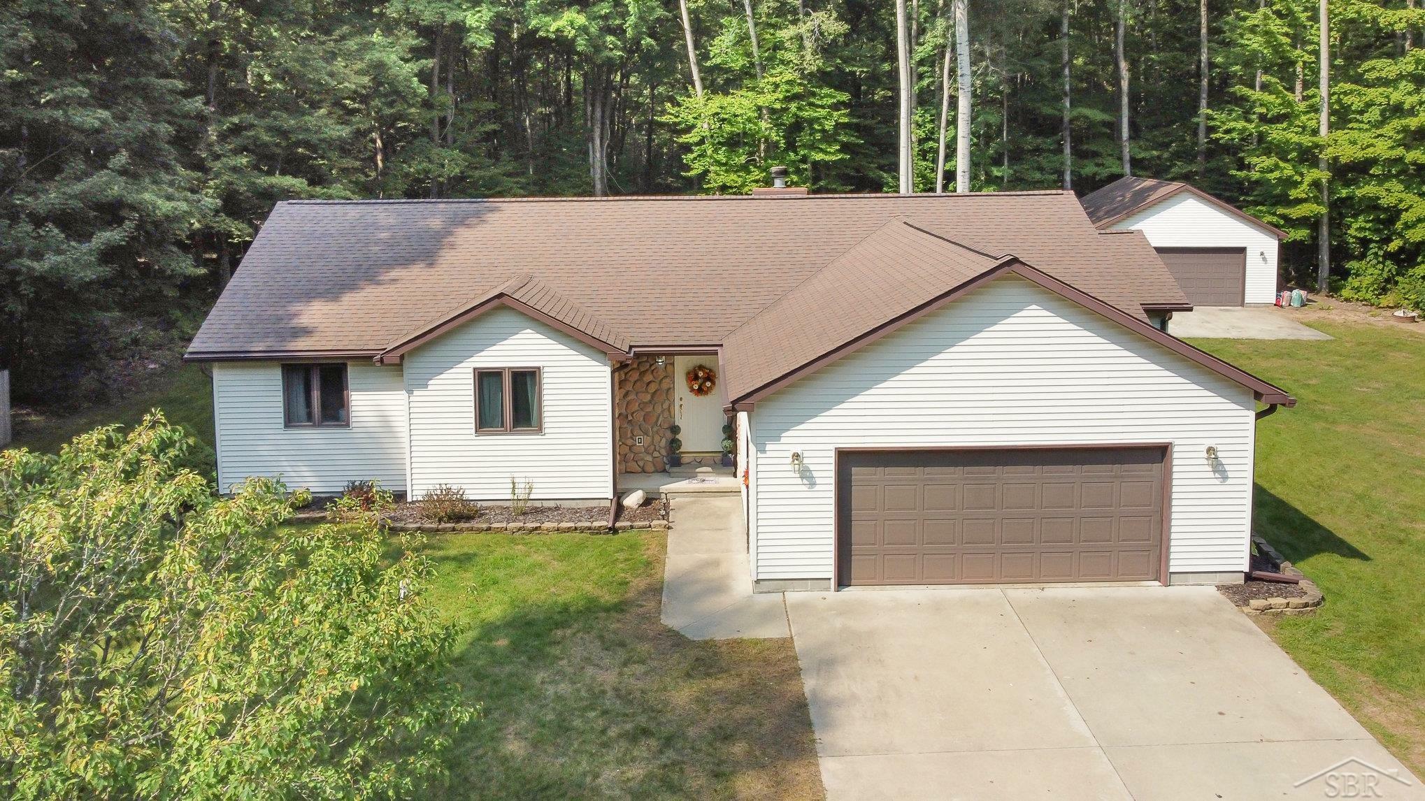 Property Photo:  6124 Deerfield Drive  MI 49738 