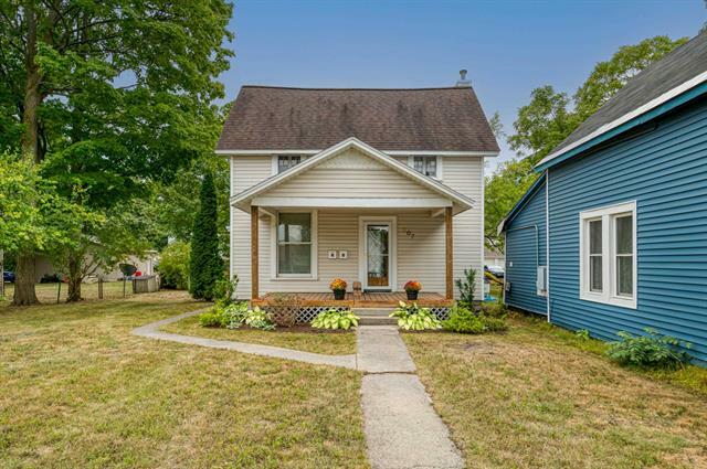 Property Photo:  207 W Ninth Street  MI 49684 