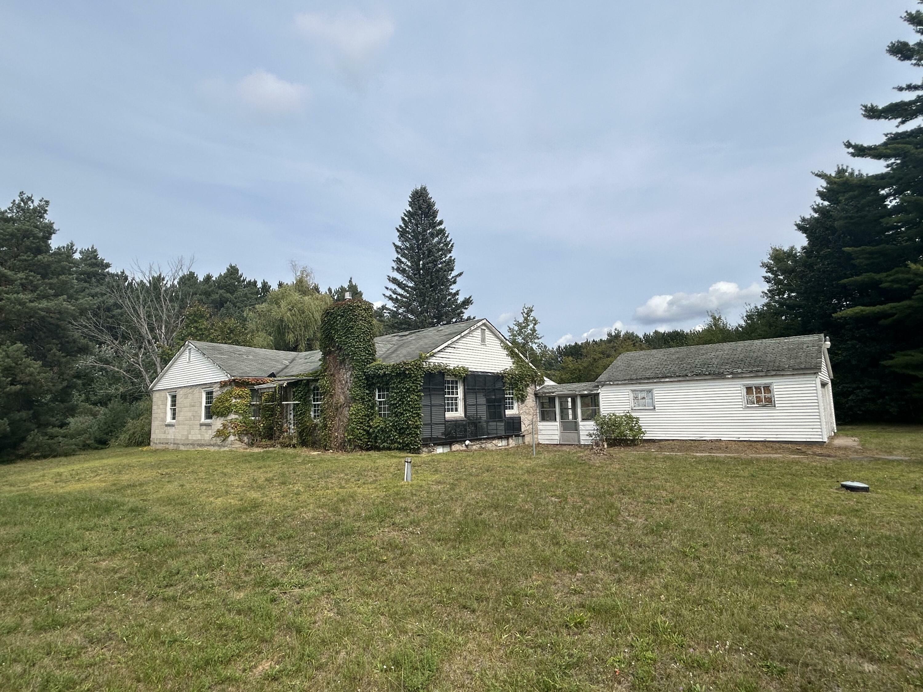 Property Photo:  7729 Airport Road  MI 49795 