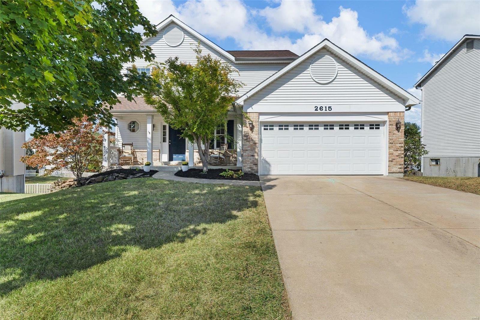 Property Photo:  2615 Red Cedar Parc Drive N  MO 63368 