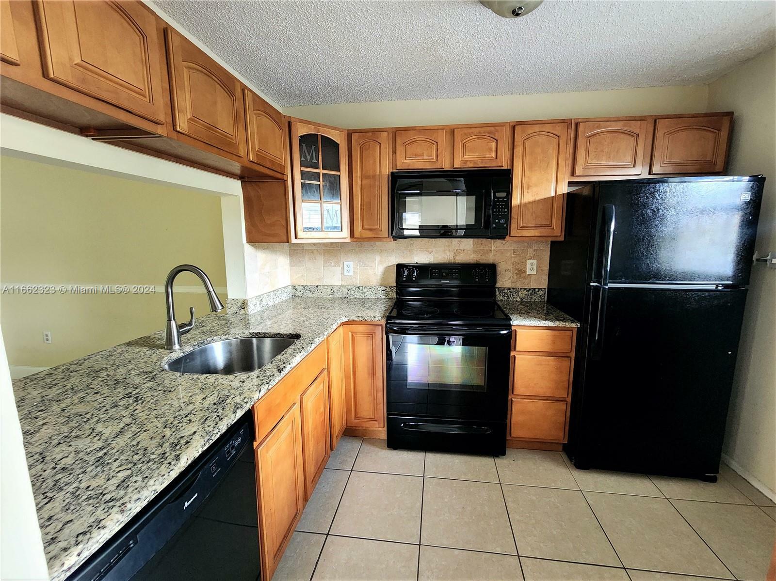 Property Photo:  125 NW 91st Ave 101  FL 33024 