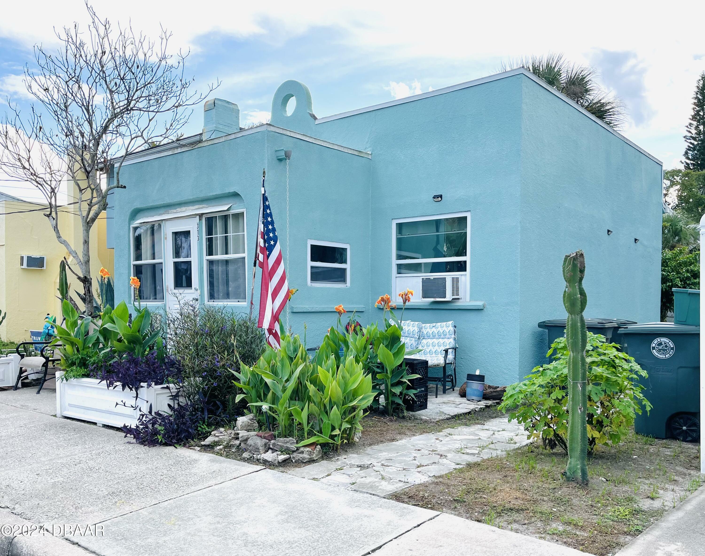 Property Photo:  311-313 N Oleander Avenue  FL 32118 