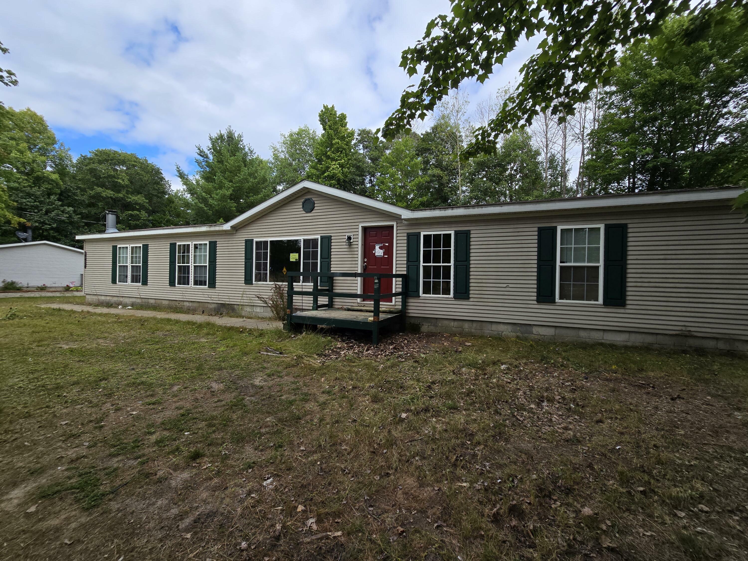 Property Photo:  9113 S Old 27 South  MI 49735 