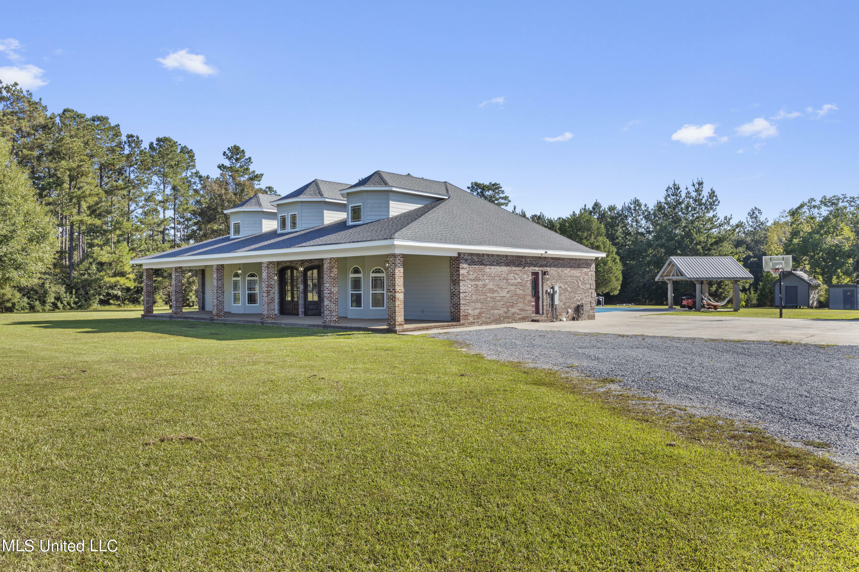 Property Photo:  10186 Wire Road  MS 39565 