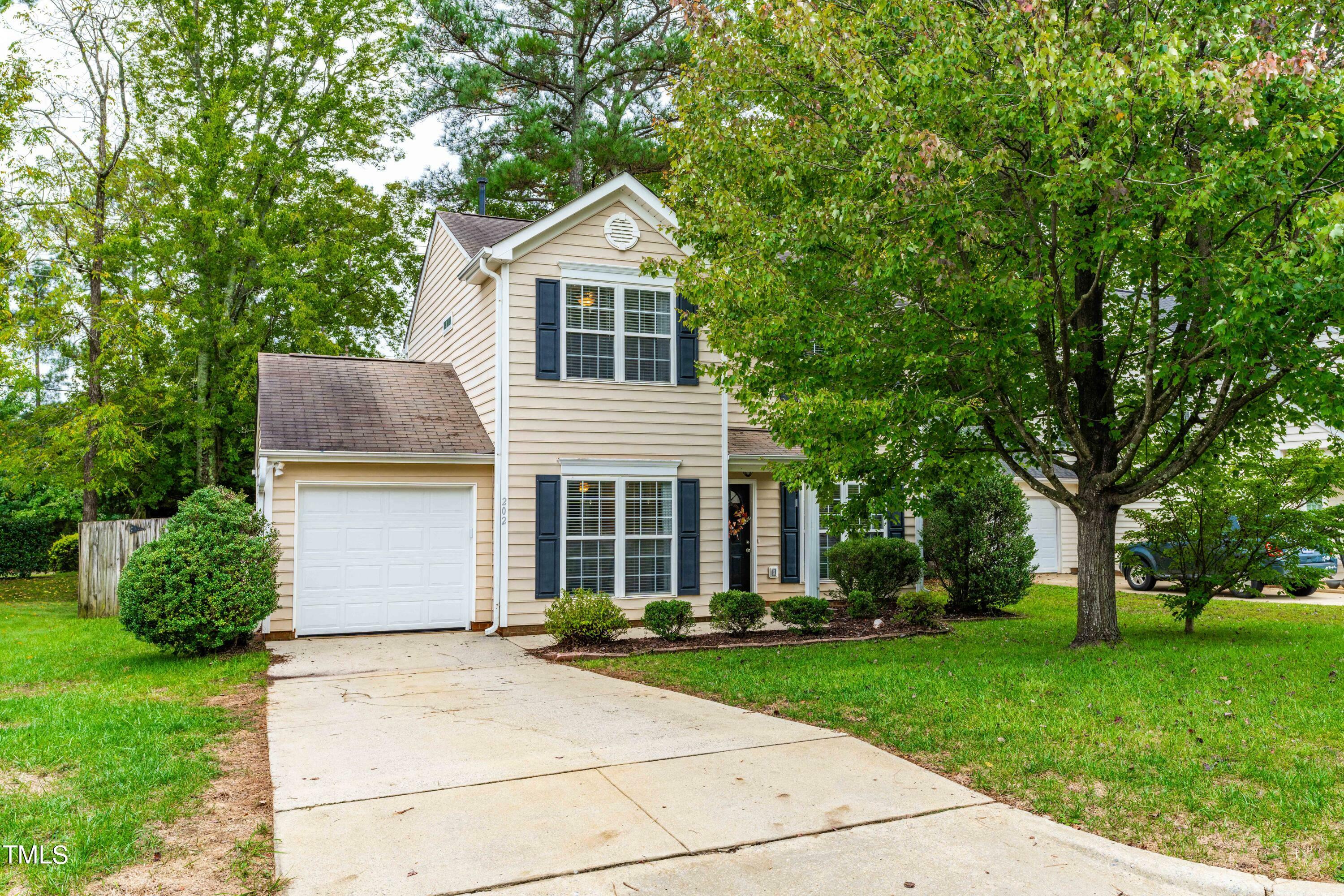 Property Photo:  202 Ridge Lake Drive  NC 27539 