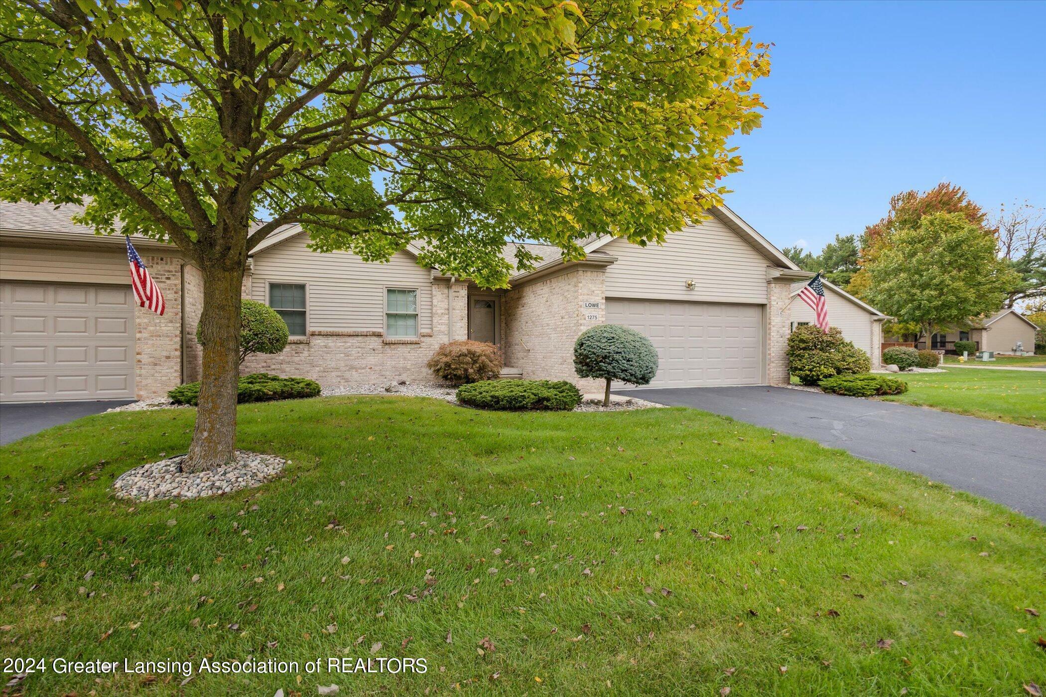 Property Photo:  1275 Emerald Drive  MI 48813 