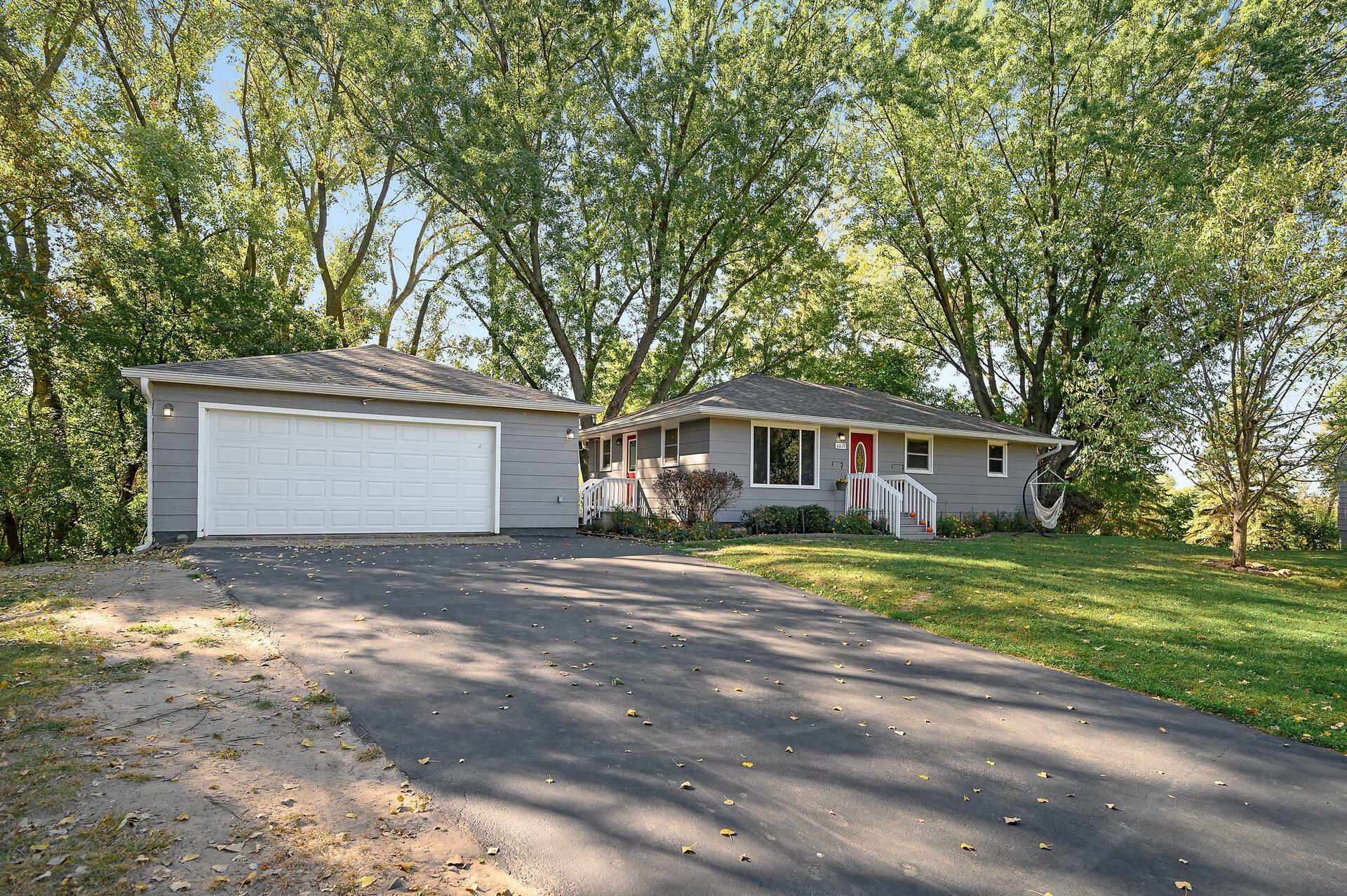 Property Photo:  6819 11th Street N  MN 55128 