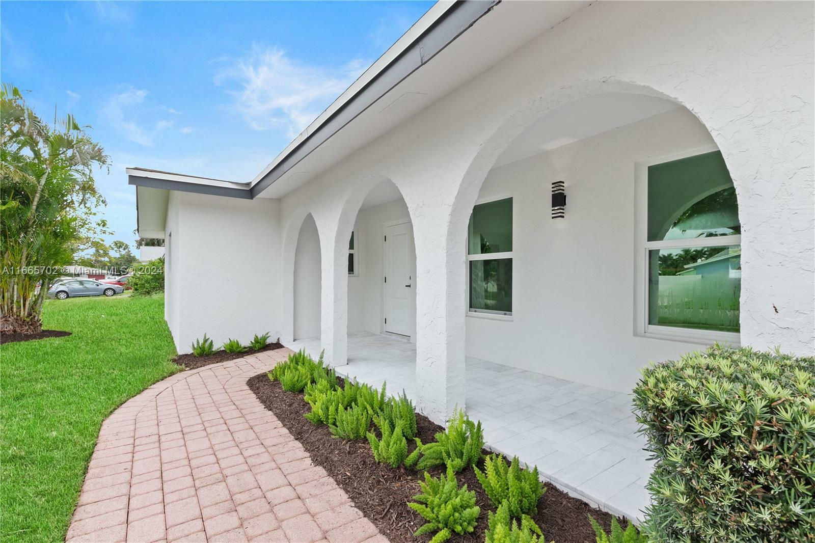 Property Photo:  1780 SW 12th St  FL 33486 