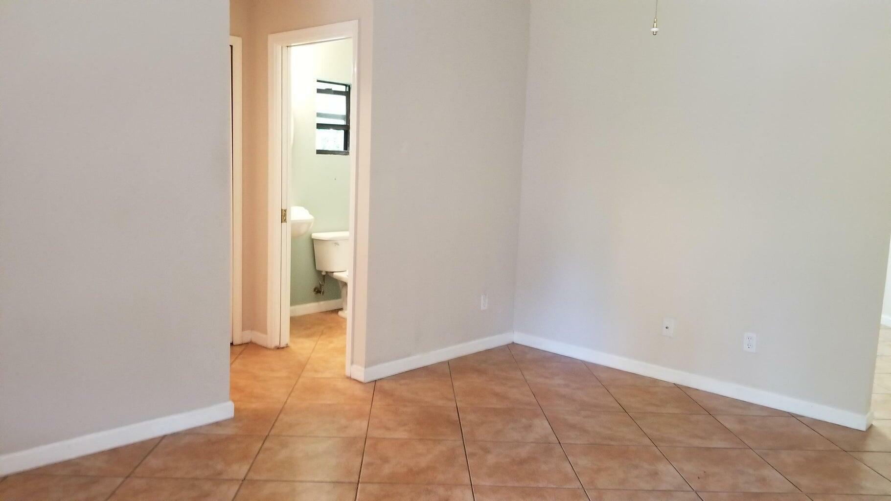 Property Photo:  12218 56th Place N Guest House  FL 33411 