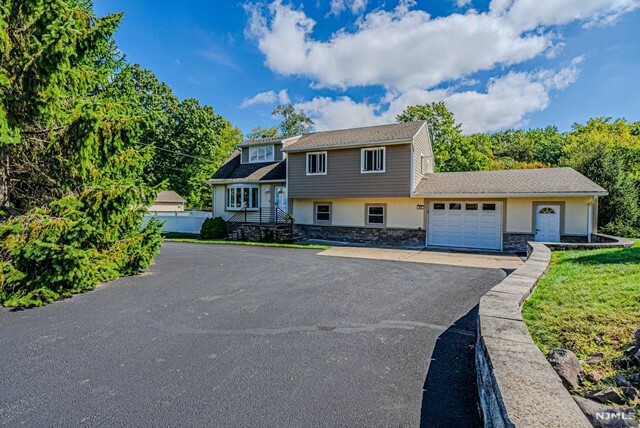 Property Photo:  403 Rifle Camp Road  NJ 07424 