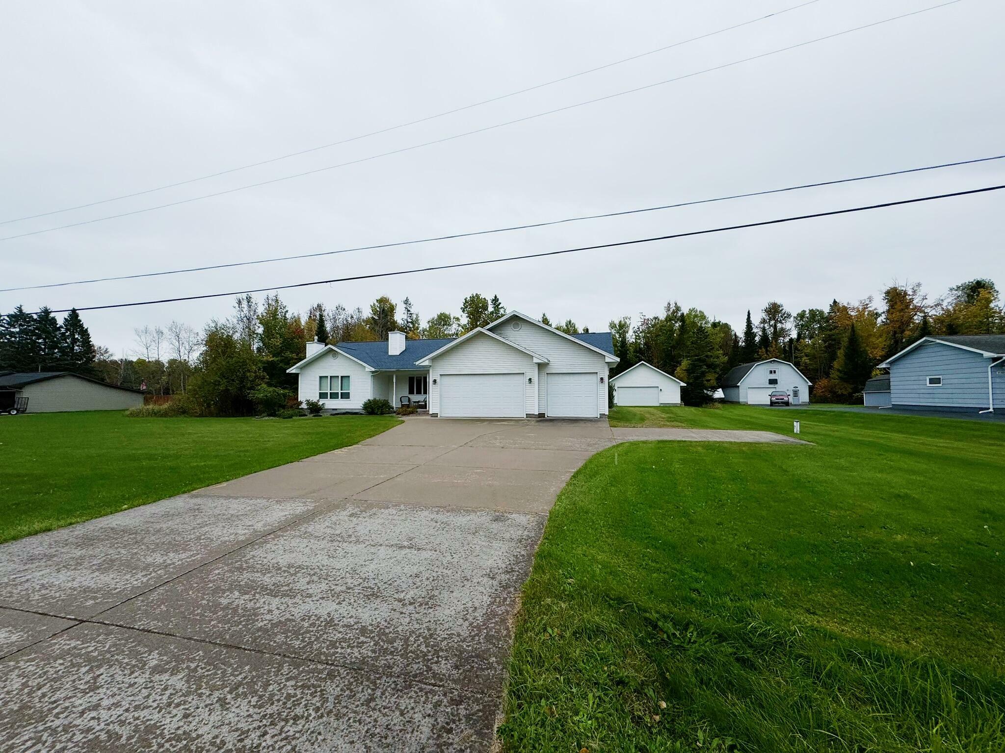 Property Photo:  3216 S Sun Glo Dr  MI 49783 