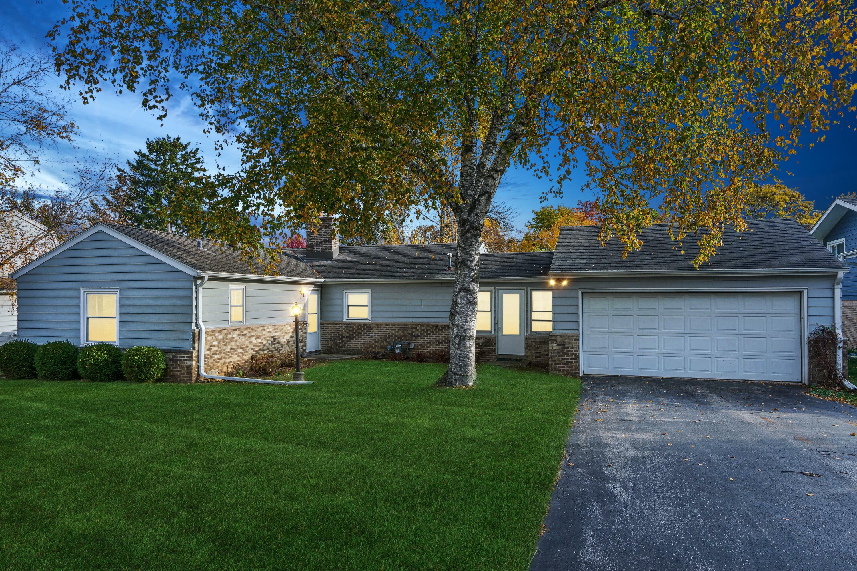 Property Photo:  6980 N Longview Ave  WI 53209 