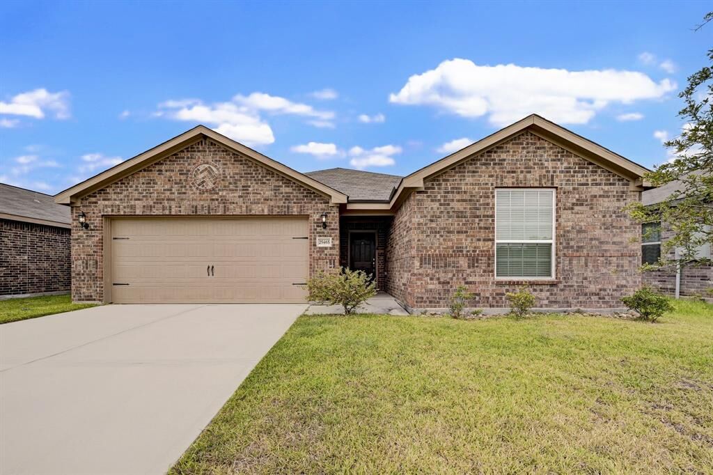 Property Photo: 25465 Black Spruce Drive TX 77328