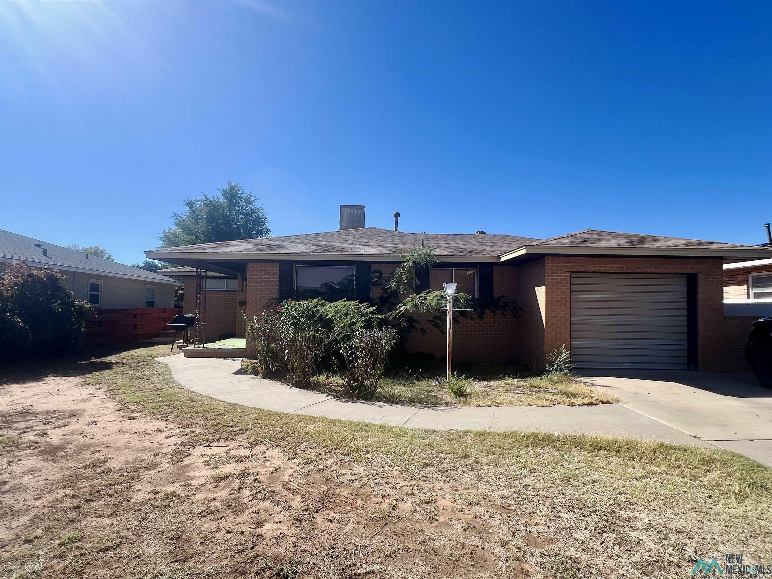 Property Photo:  2704 Wallace Street  NM 88101 