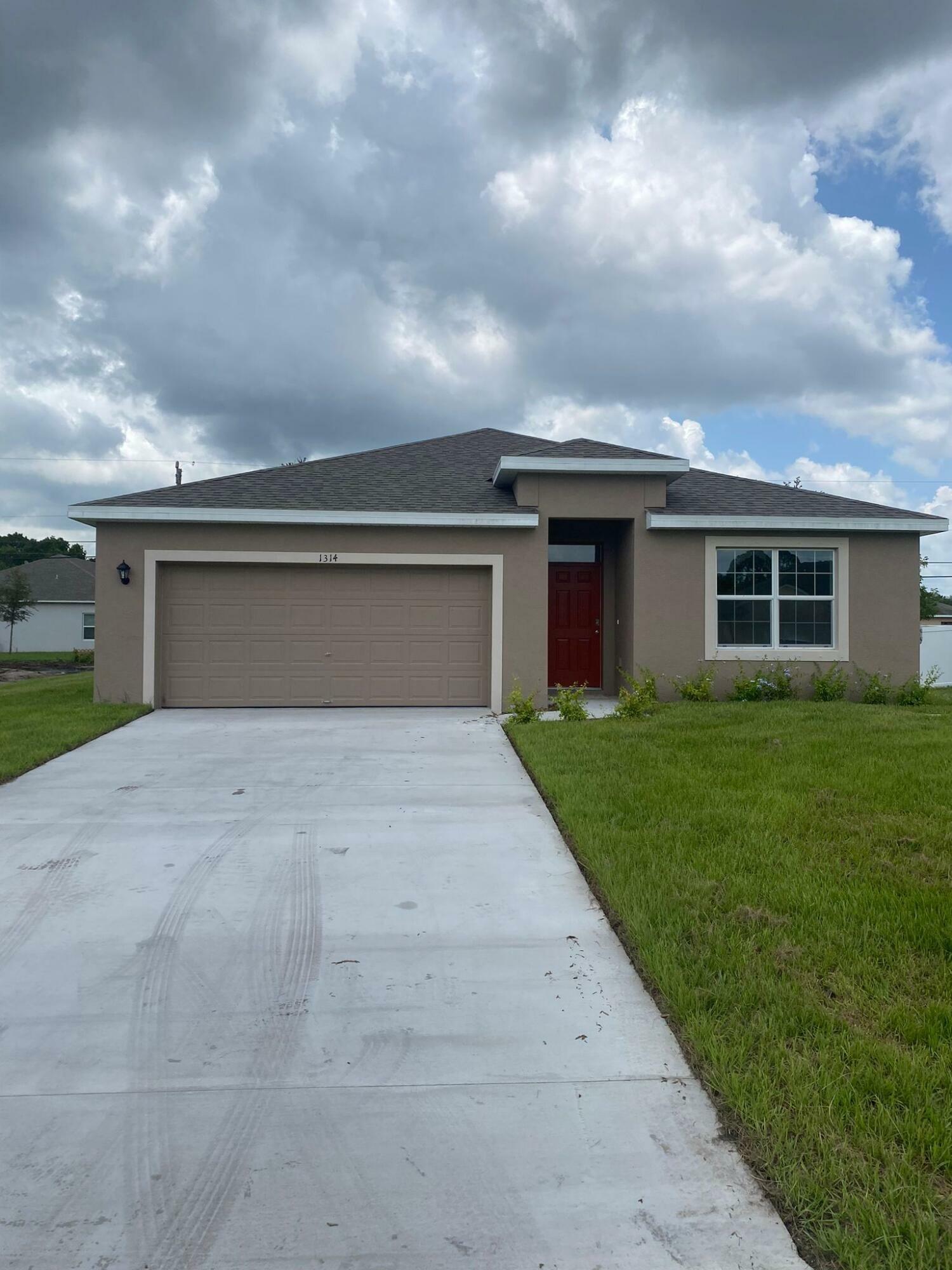 Property Photo:  1314 SW Goodman Avenue  FL 34953 