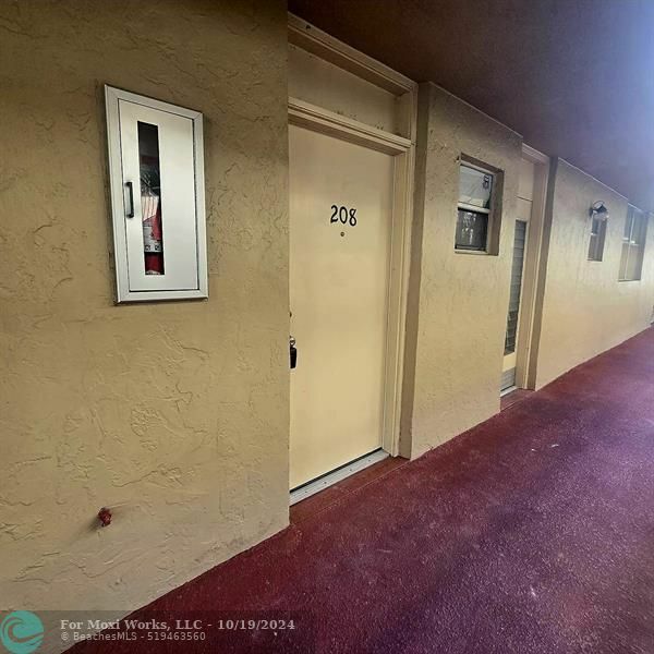 Property Photo:  410 NW 68th Ave 208  FL 33317 