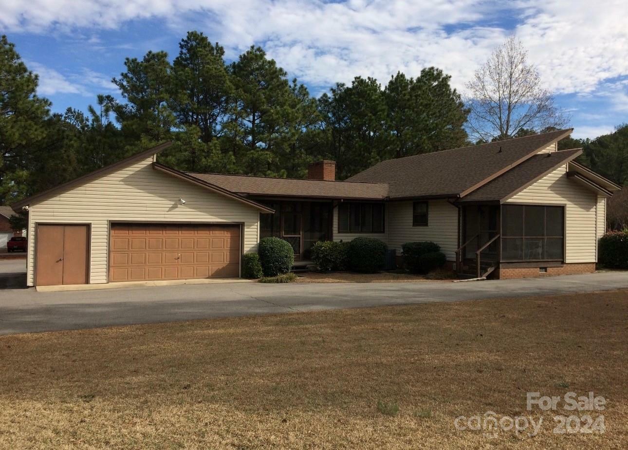 Property Photo:  102 Shenandoah Road E  NC 27376 