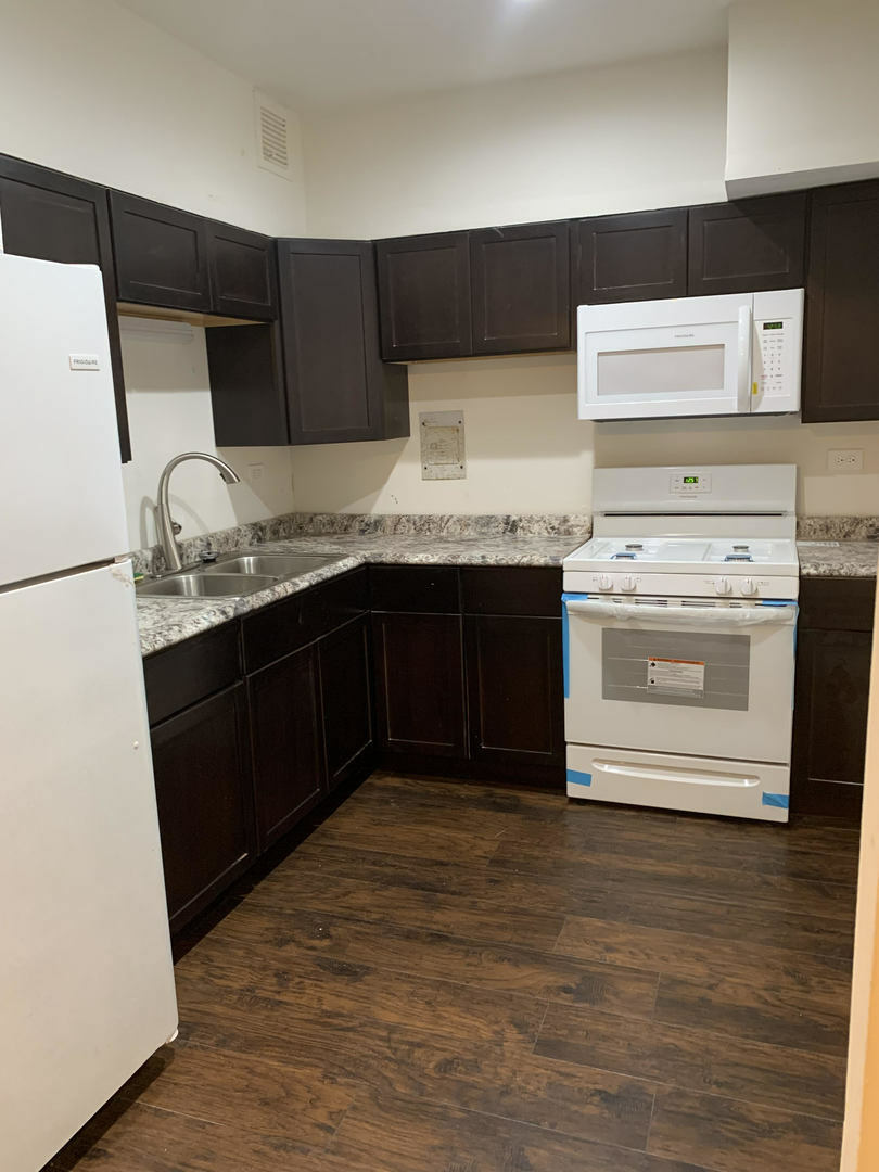 Property Photo:  6700 S Paxton Avenue G1  IL 60649 