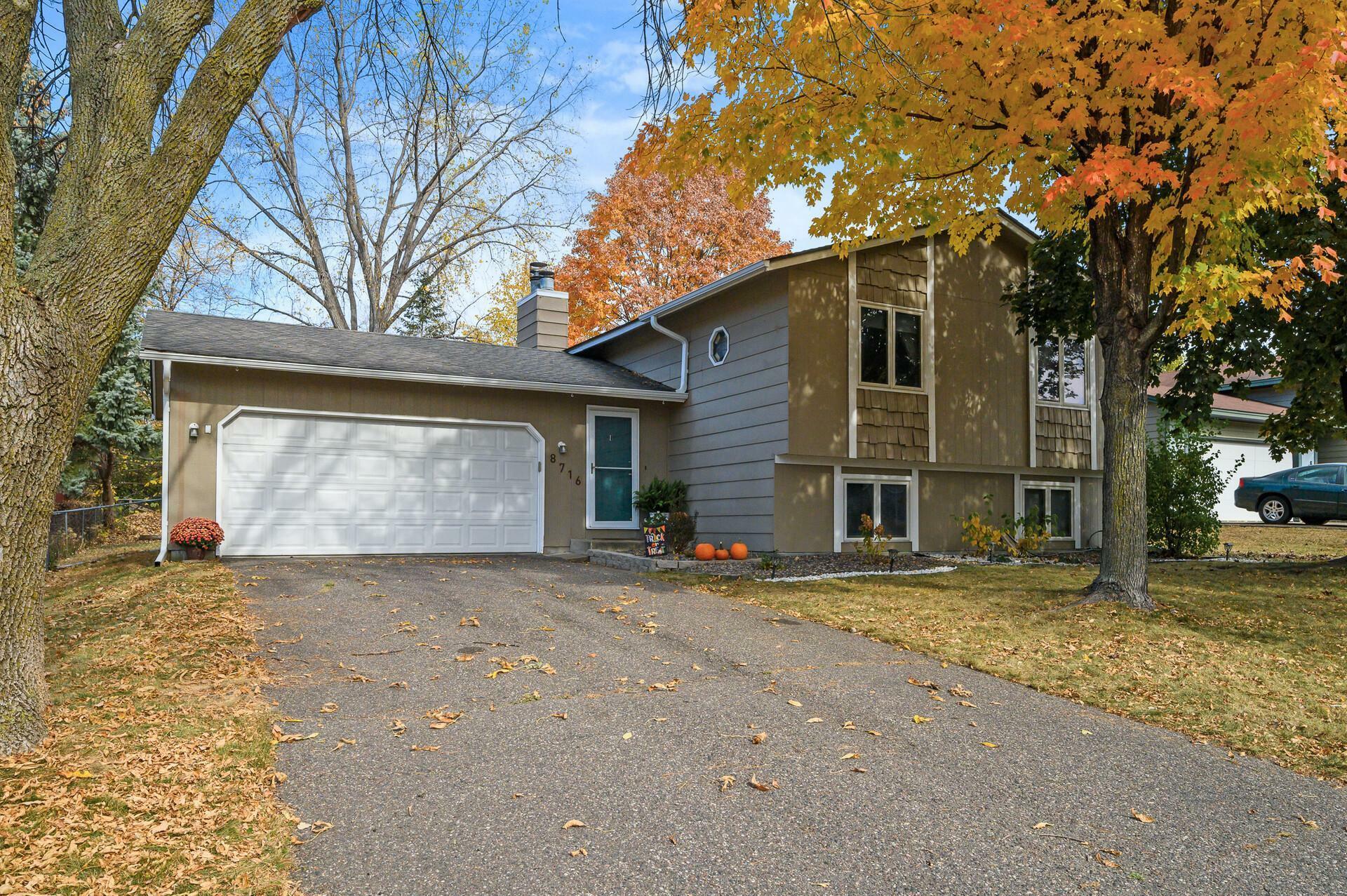 Property Photo:  8716 64th Avenue N  MN 55428 