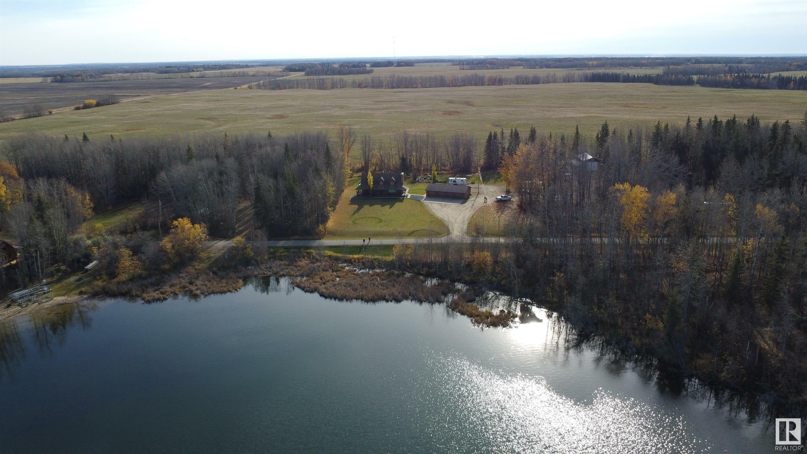 Property Photo:  8 Sunrise Dr Summer Village Of Larkspur  AB T0G 0S0 