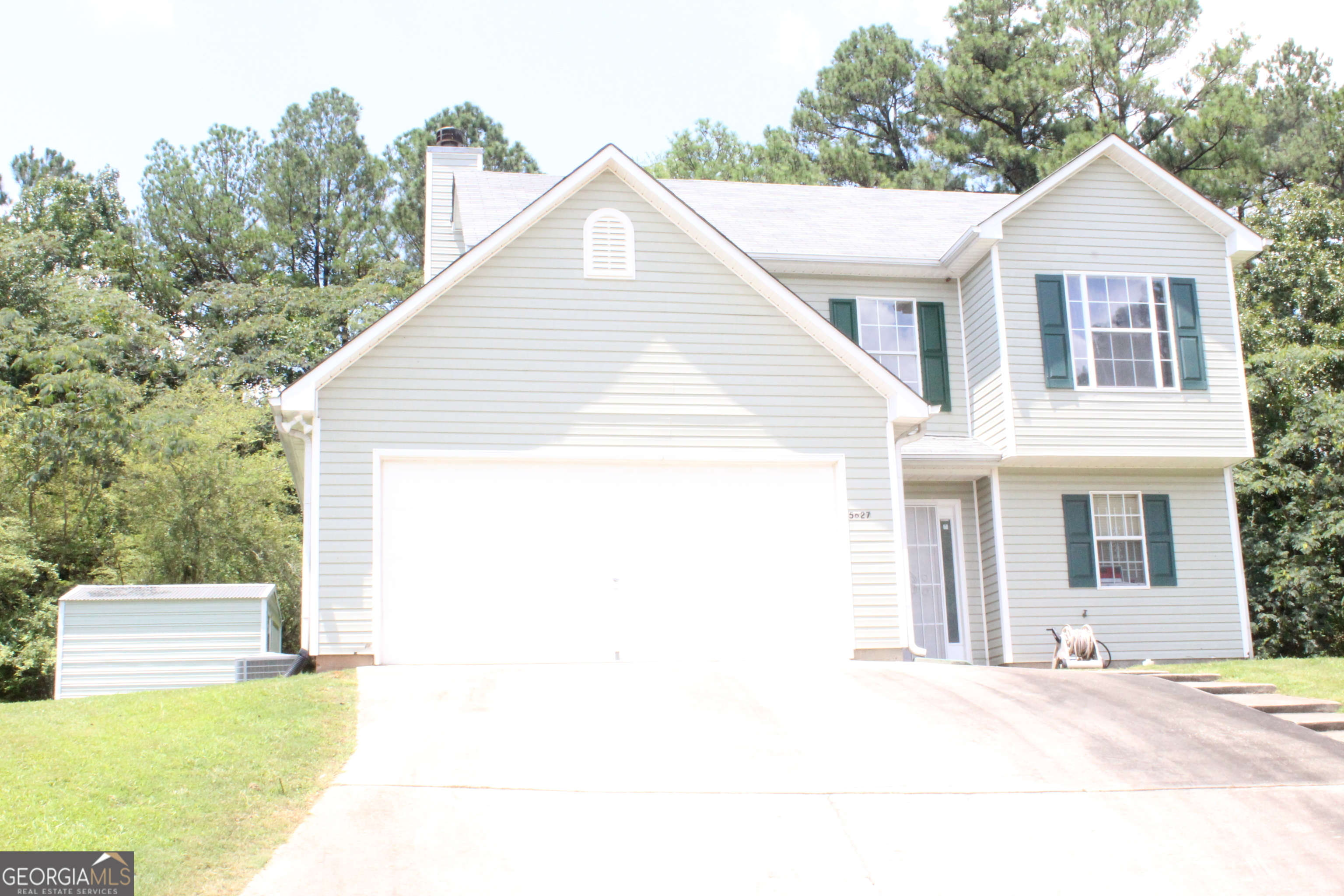 Property Photo:  5627 Isleworth Court  GA 30349 