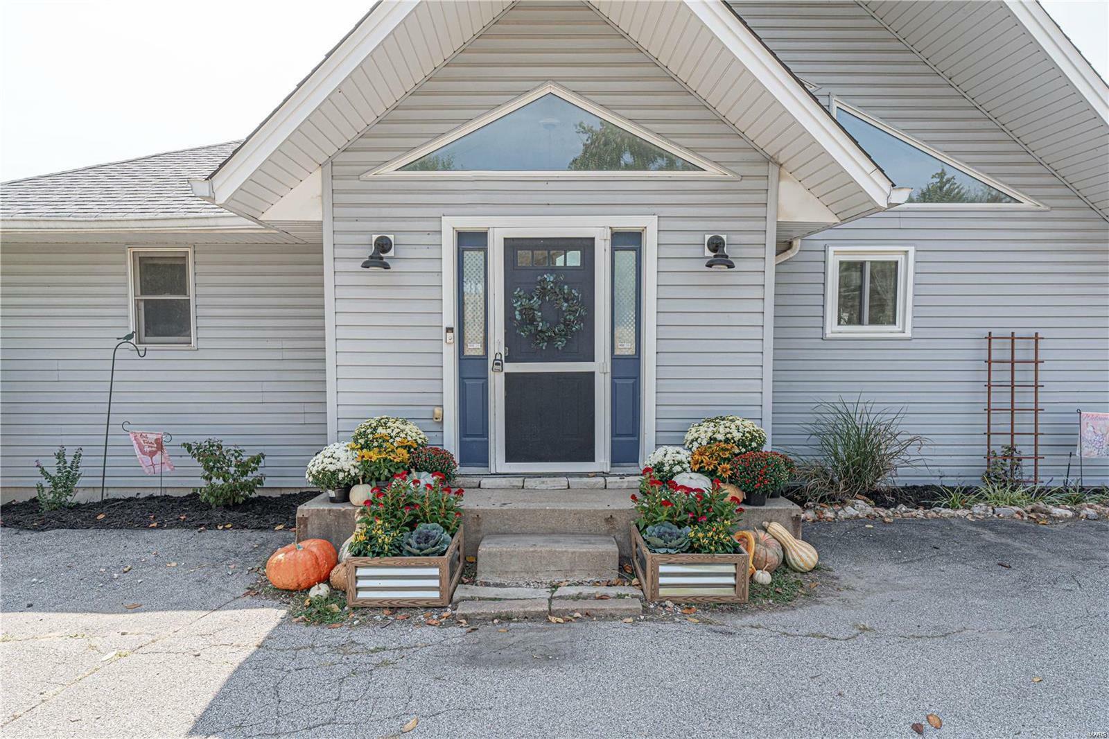 Property Photo:  8239 Rocky Woods  MO 63050 