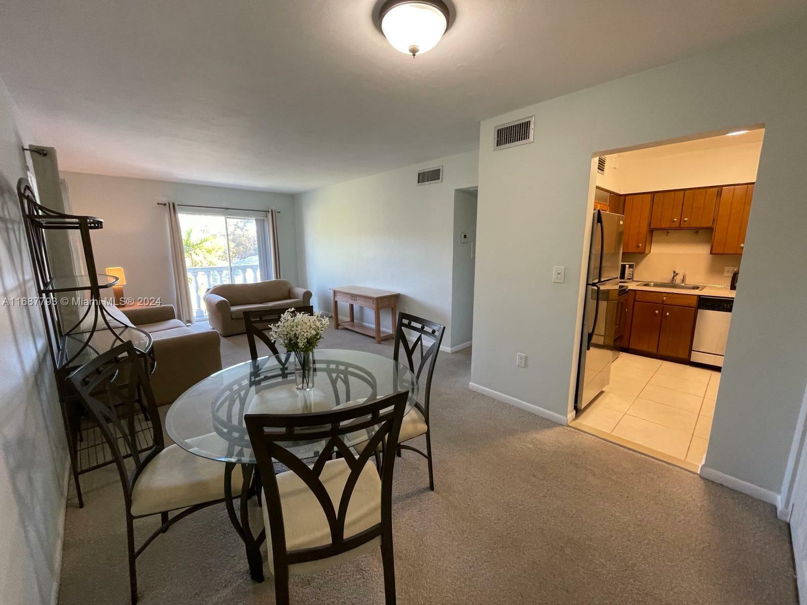 Property Photo:  1150 Madruga Ave C304  FL 33146 