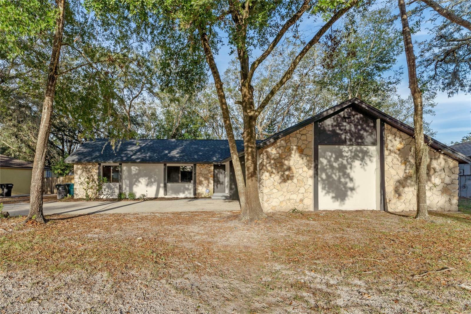 Property Photo:  5143 Barnegat Point Road  FL 32808 