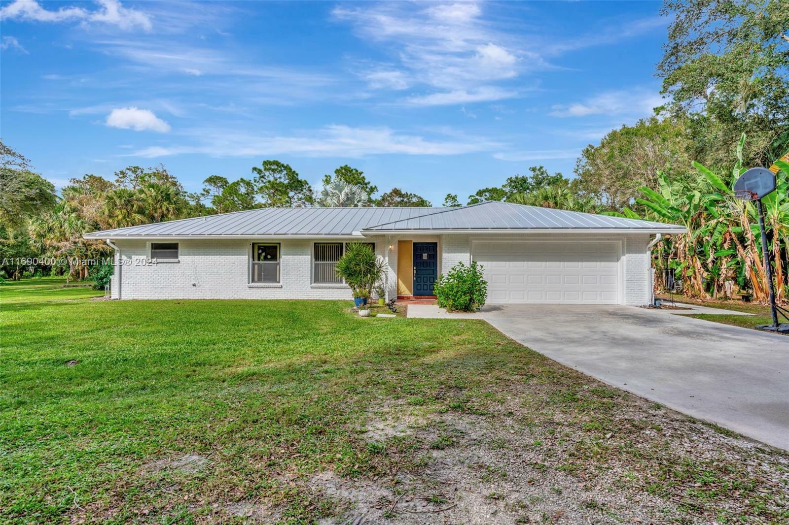 Property Photo:  11219 N 169th Ct N  FL 33478 