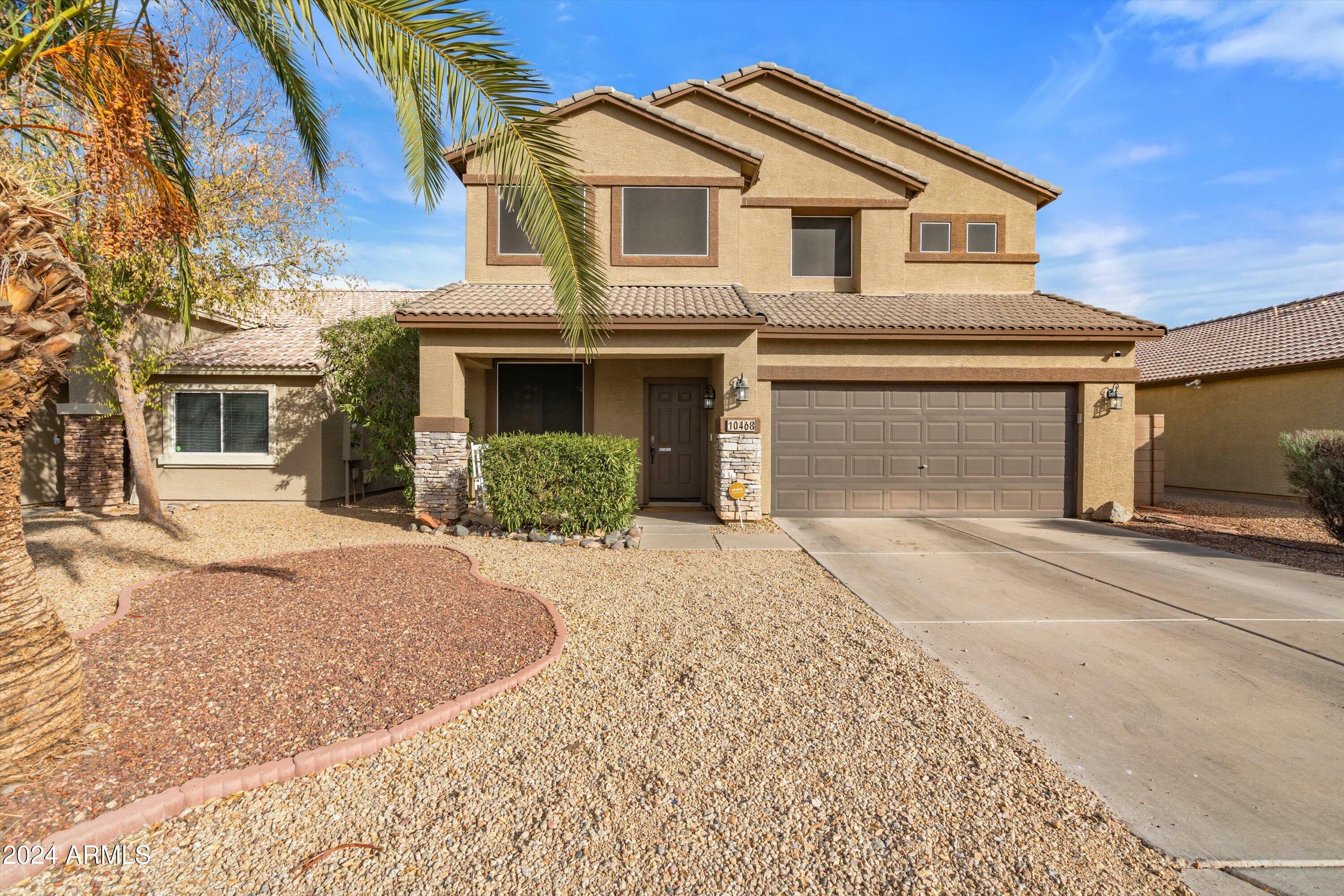 Property Photo:  10468 W Palm Lane  AZ 85392 