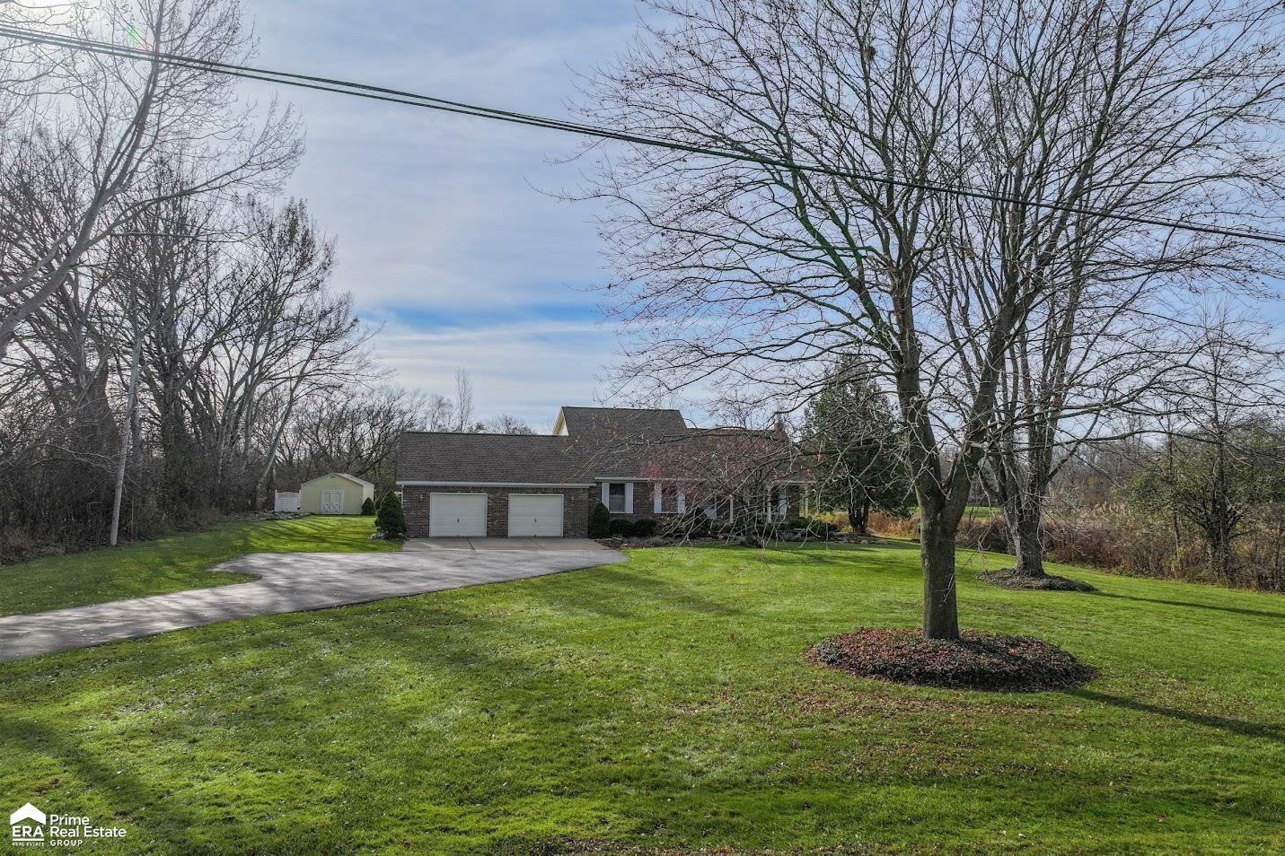 Property Photo:  9256 E. Potter Road  MI 48423 