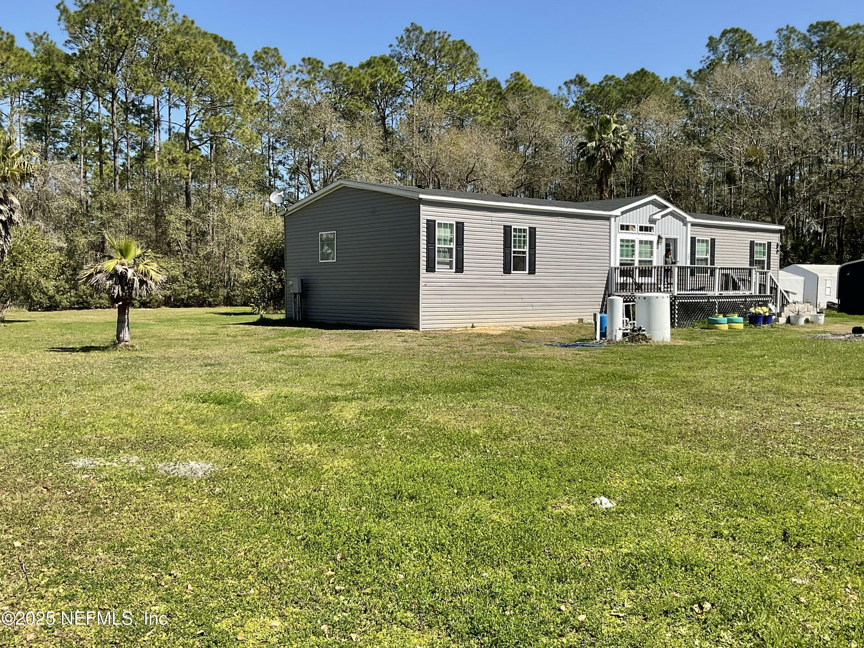 Property Photo:  100 Camp Road  FL 32177 