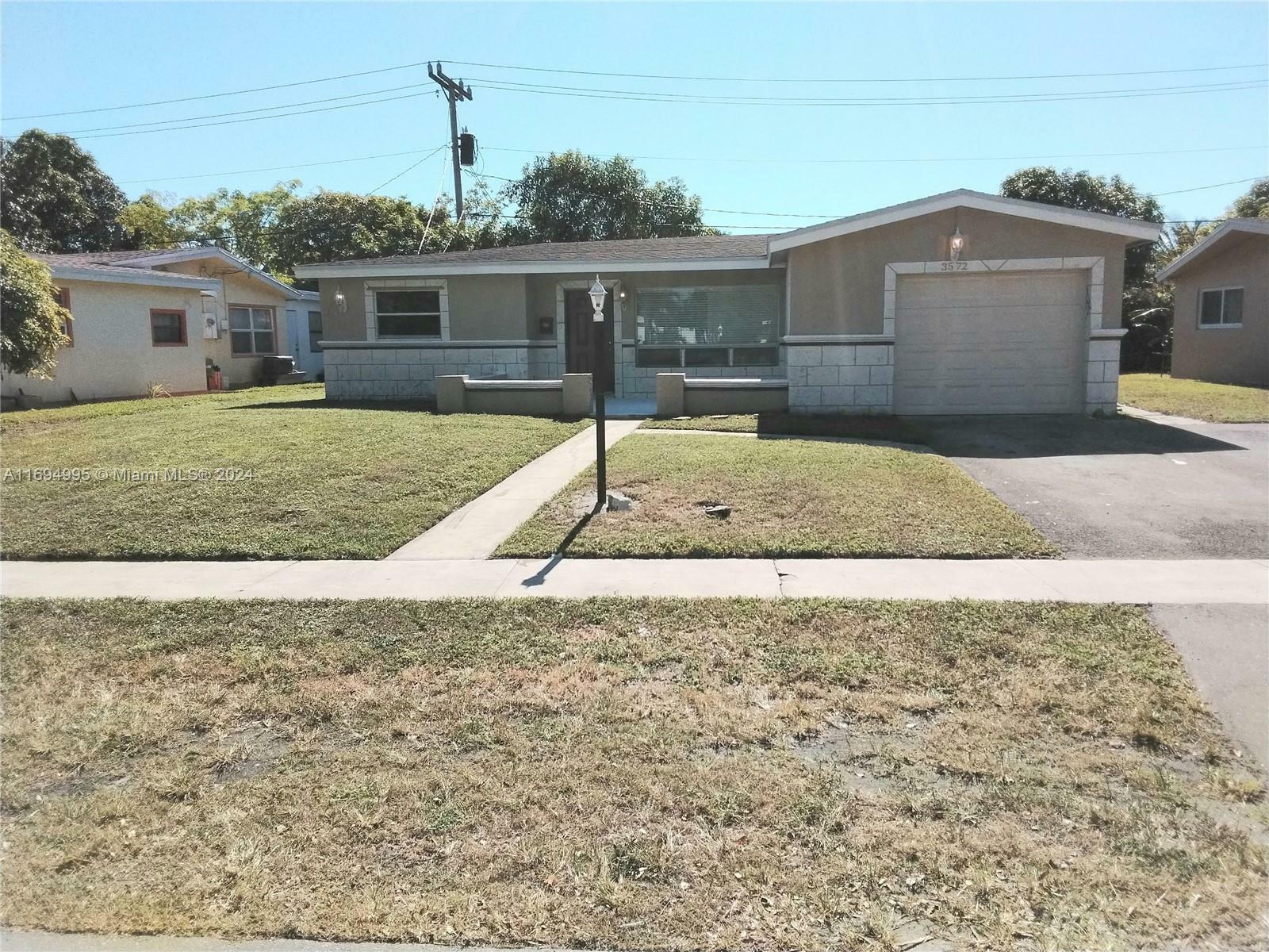 Property Photo:  3572 NW 35th St  FL 33309 