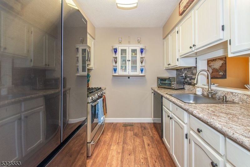 Property Photo:  30 Iron Forge Vlg  NJ 07442 