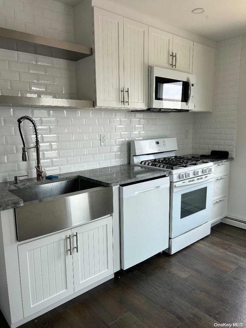 Property Photo:  161-07 99th Street  NY 11414 