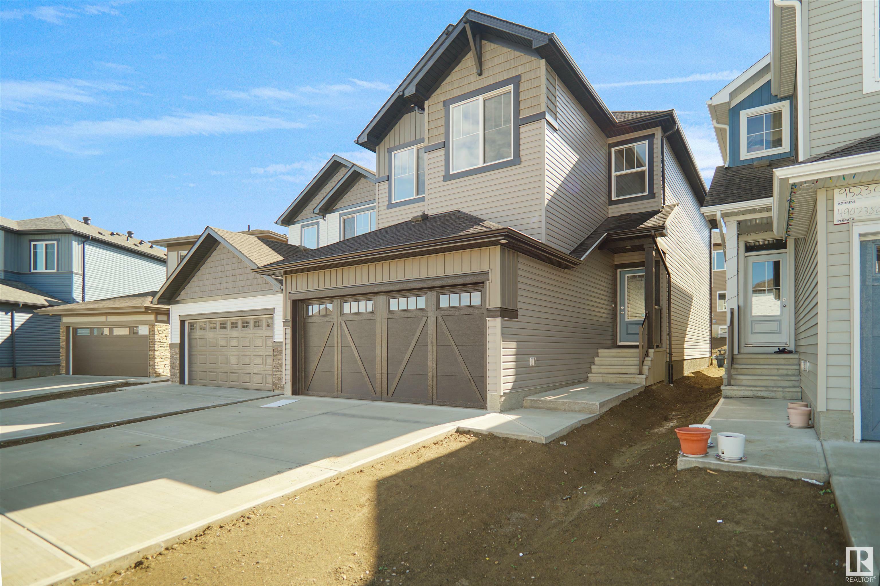 Property Photo:  13040 212 Street NW  AB T5T 7V2 